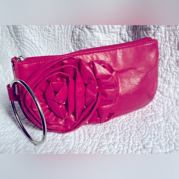 *3 for $20* Hot pink faux leather wristlet, circle handle, rosette design. - Picture 1 of 12